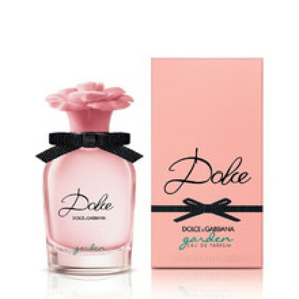 Rosa Flakon mit rosa Blütenverschluss und schwarzer Schleife. Daneben die passende Verpackung mit Schriftzug Dolce.