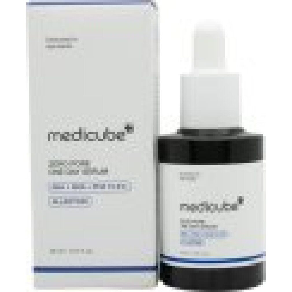 Dunkelblaue Medicube Zero Pore One Day Serum Flasche mit blauem Deckel.