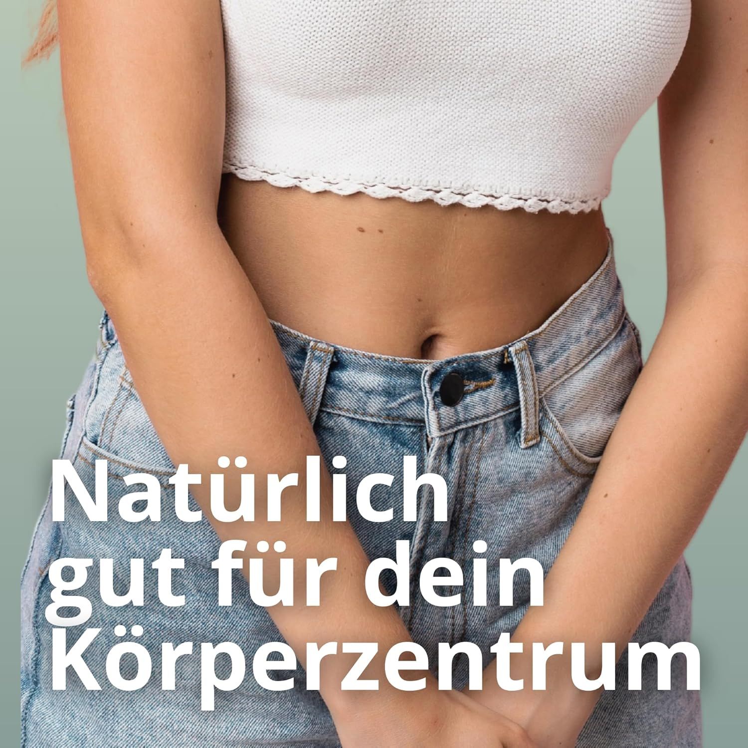 Nahaufnahme einer Person mit Jeans und weißem Top. Text: "Natürlich gut für dein Körperzentrum". Hintergrund: hellgrün.