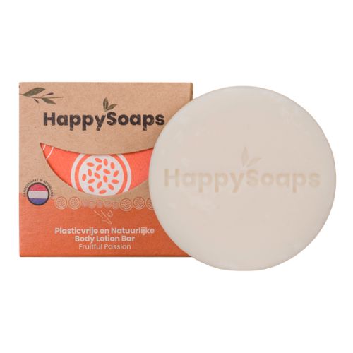 Runder, cremefarbener Body Lotion Bar neben Verpackung. Verpackung mit Logo Happy Soaps, Passionsfrucht-Design und Text.