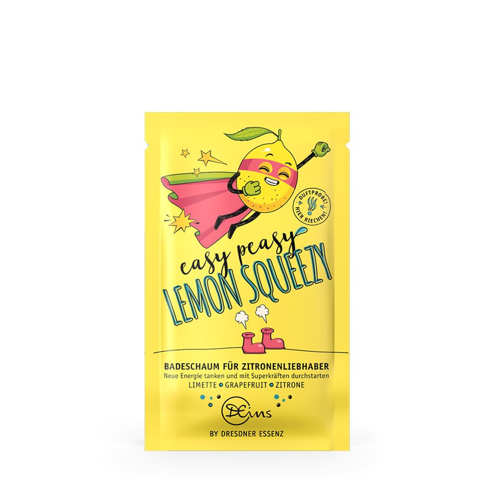 Gele verpakking met 'easy peasy LEMON SQUEEZY'. Illustratie van een citroen als superheld. Opschrift 'Badschuim voor citroenliefhebbers'.