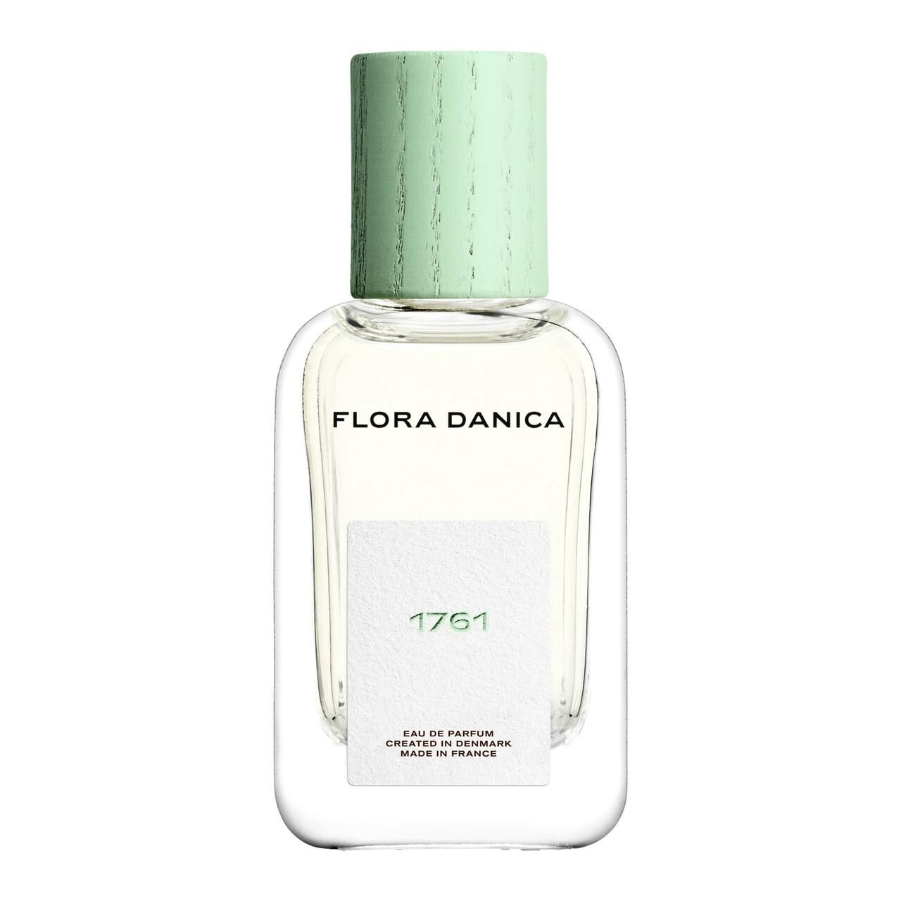 Parfümflasche mit grünem Deckel. Auf dem Etikett steht "Flora Danica 1761".