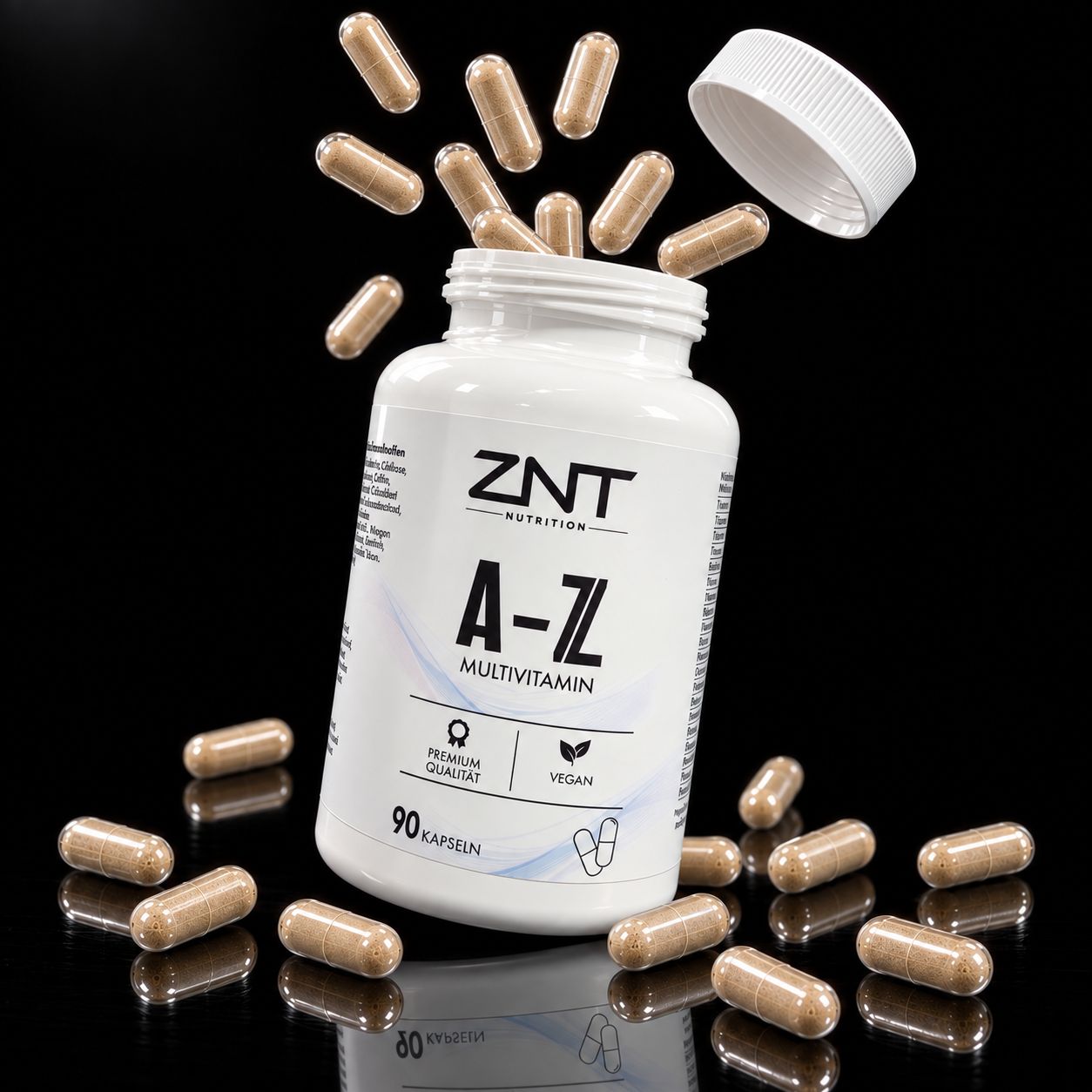ZNT Nutrition A-Z Multivitamin Kapseln fliegen aus einer geöffneten Flasche.