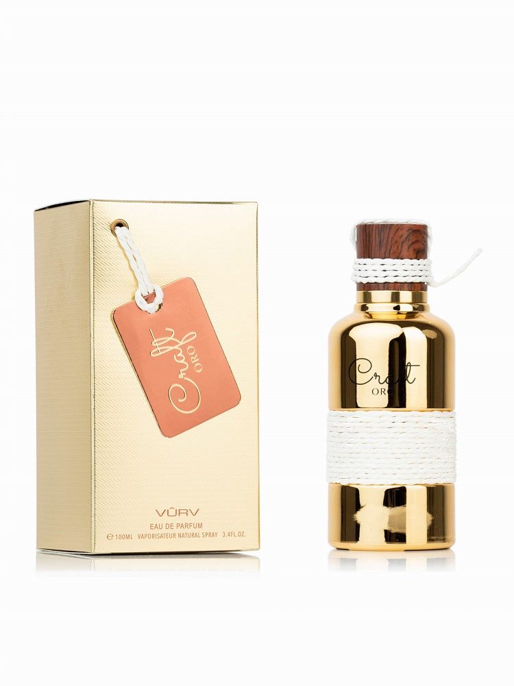 Goldfarbene Parfumflasche mit weißem Band und Holzverschluss. Goldene Schachtel mit Anhänger. Aufschrift: Croft Oro.