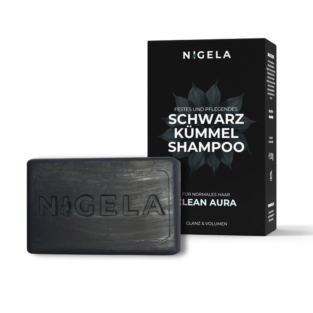 Schwarze Seife mit Nigela-Logo und schwarze Schachtel mit Produktinformationen.