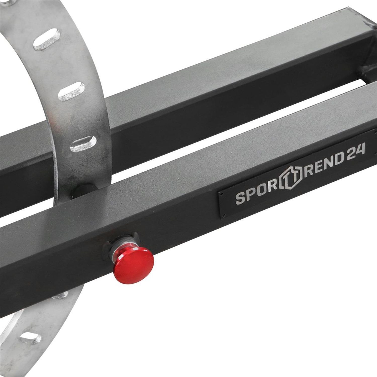 Nahaufnahme eines schwarzen Metallrahmens. Sporttrend24 Logo und roter Knopf. Teil einer verstellbaren Trainingsbank.
