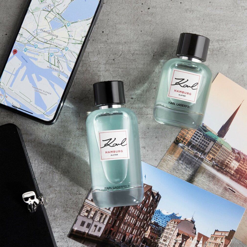 Zwei Karl Lagerfeld Hamburg Alster E.d.T. Nat. Spray Flakons. Aufschrift Karl und Hamburg Alster. Neben Smartphone.