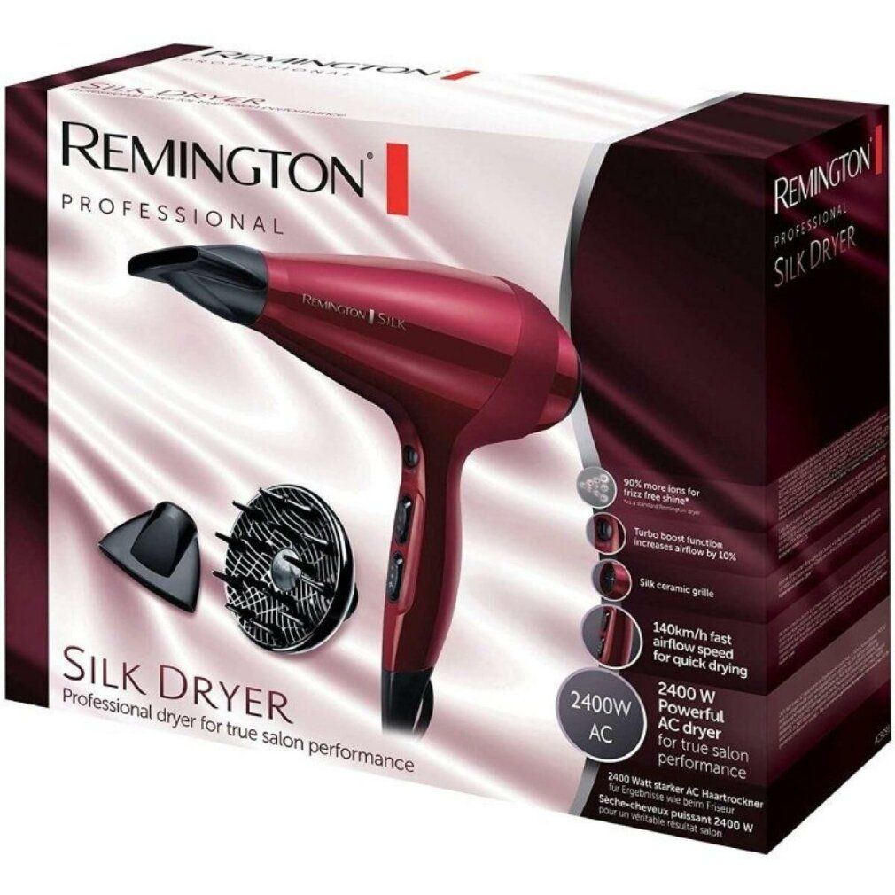 Haartrockner in Verpackung. Marke Remington Silk Dryer. Roter Haartrockner, zwei Aufsätze. Text: 2400W, 140km/h.