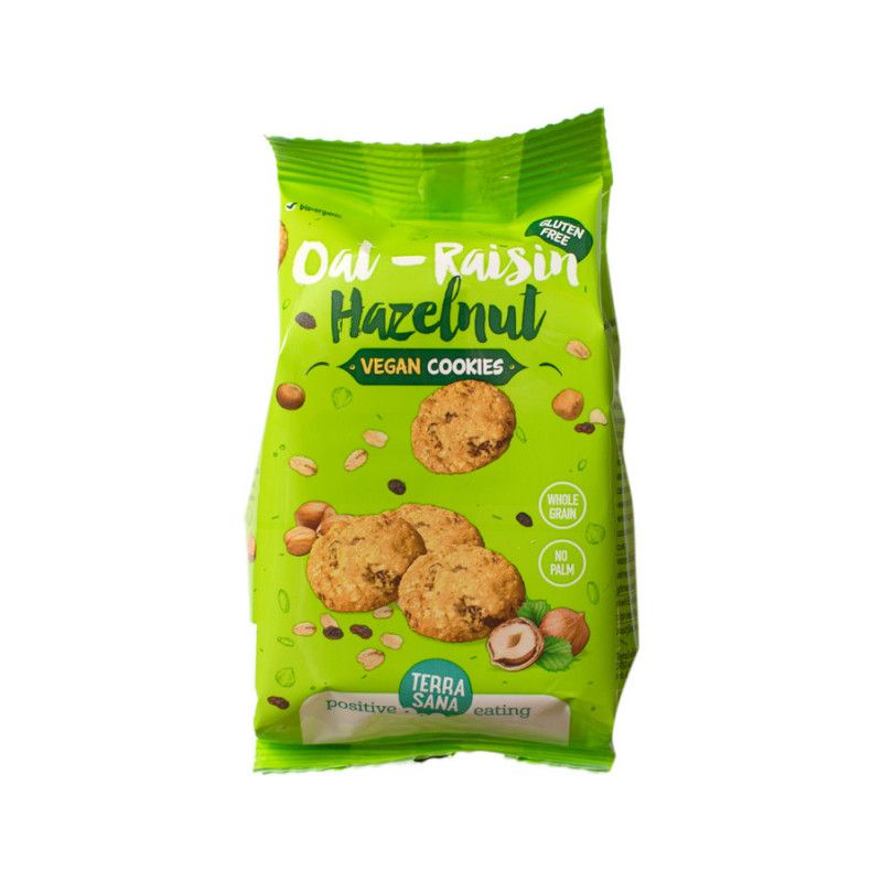 Grüne Verpackung mit Keksen. Aufschrift: Oat-Raisin Hazelnut Vegan Cookies. Marke: Terra Sana. Glutenfrei.