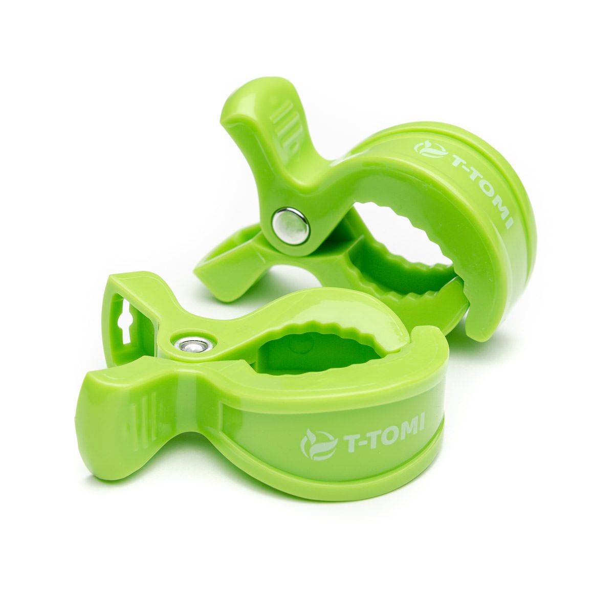 Zwei grüne T-TOMI Clips mit Logo auf weißem Hintergrund.