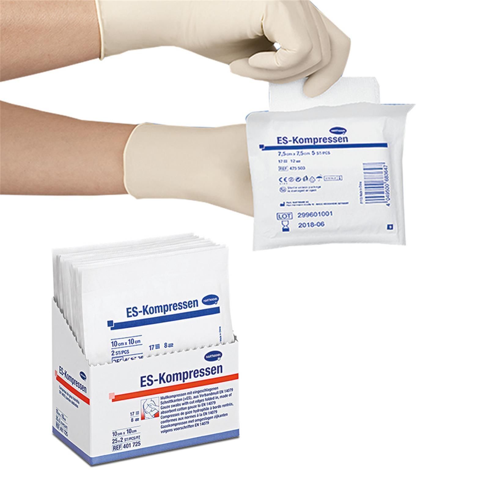ES-Kompressen in Verpackung. Eine Hand in Handschuh entnimmt eine Kompresse. Darunter eine Box mit weiteren Kompressen.