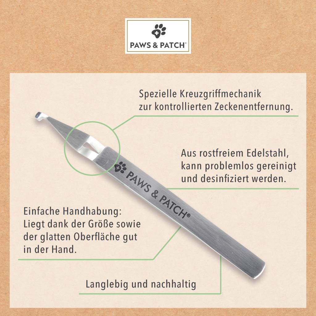 Zecken-Duo-Werkzeug aus Edelstahl. Beschriftung: PAWS & PATCH. Text: Spezielle Kreuzgriffmechanik, einfache Handhabung, langlebig.