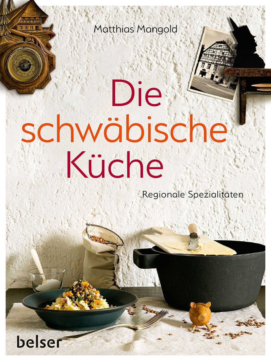 Buchcover: "Die schwäbische Küche" von Matthias Mangold. Auf weißem Hintergrund, mit Kochutensilien und Essen.