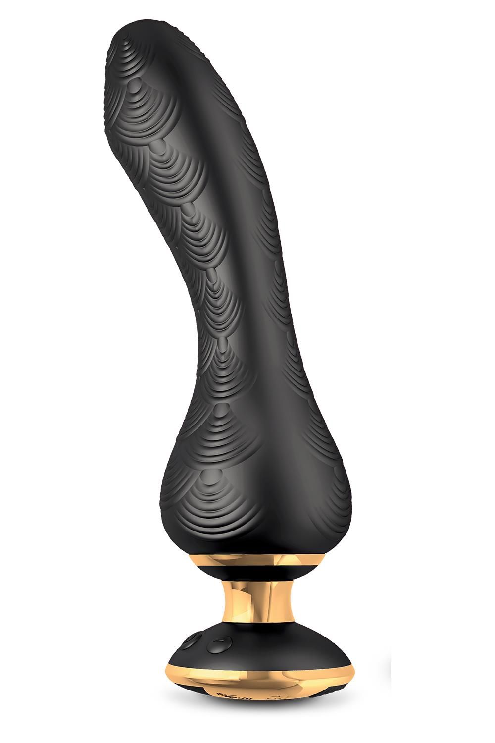 Schwarzes Wellness-Produkt mit goldfarbenem Sockel. Oberfläche mit Muster. Form: gebogen.
