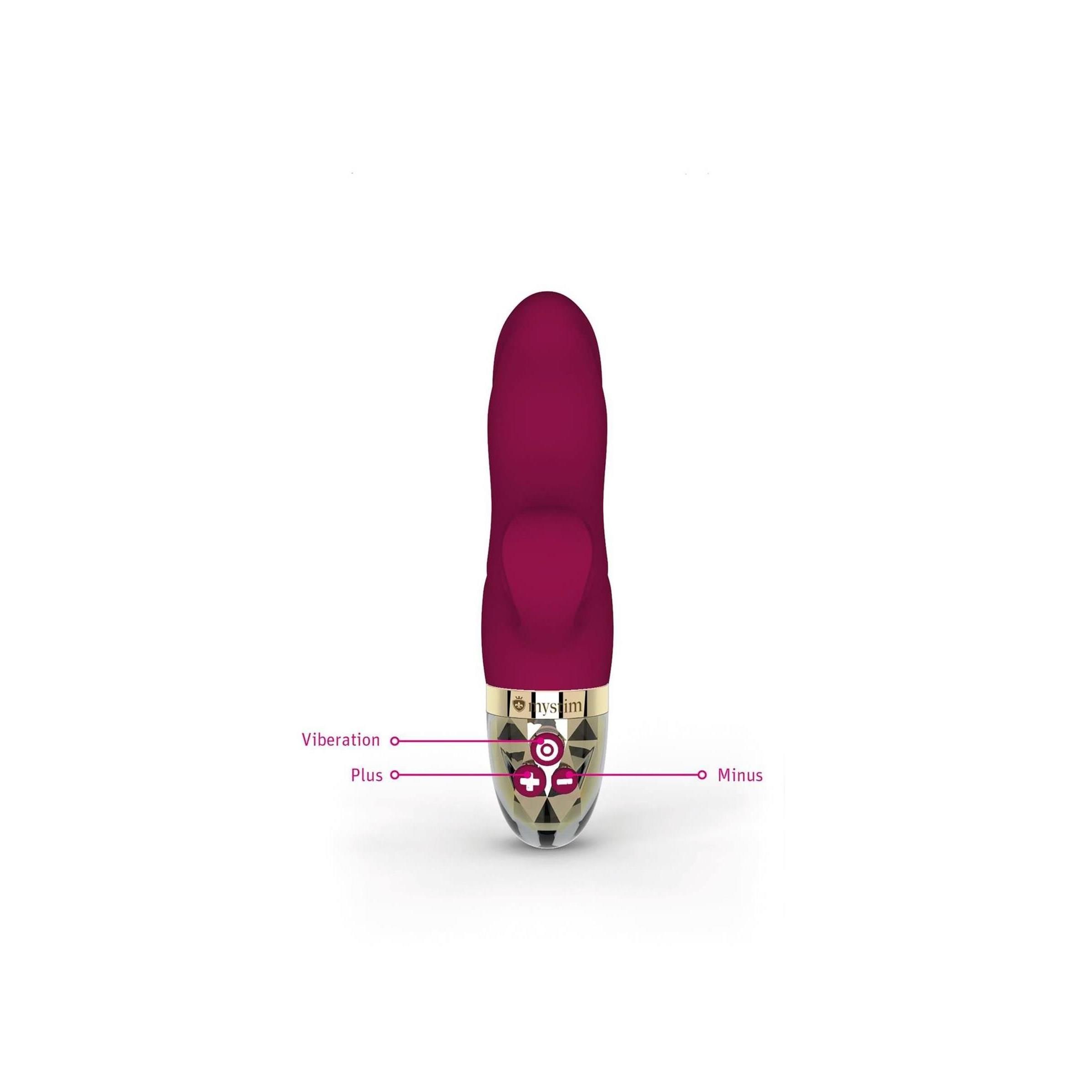 Fuchsiafarbener Vibrator mit Bedienknöpfen. Plus- und Minus-Tasten. Vibrationssymbol. Goldfarbener Ring. Kristalloptik am Boden.