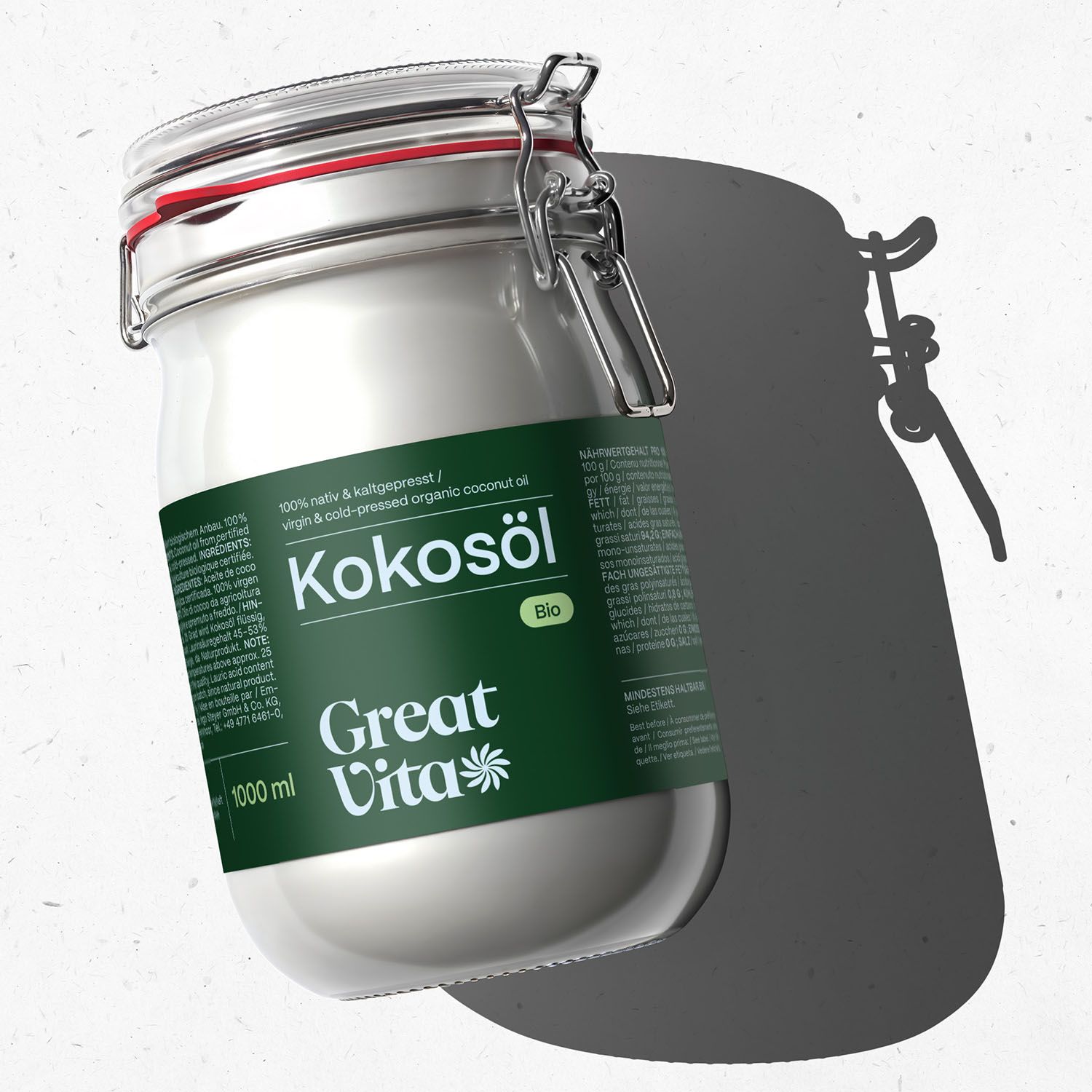 Glasbehälter mit Kokosöl-Etikett. Aufschrift: Kokosöl, Great Vita, Bio. 1000 ml. Deckel mit rotem Gummiverschluss.