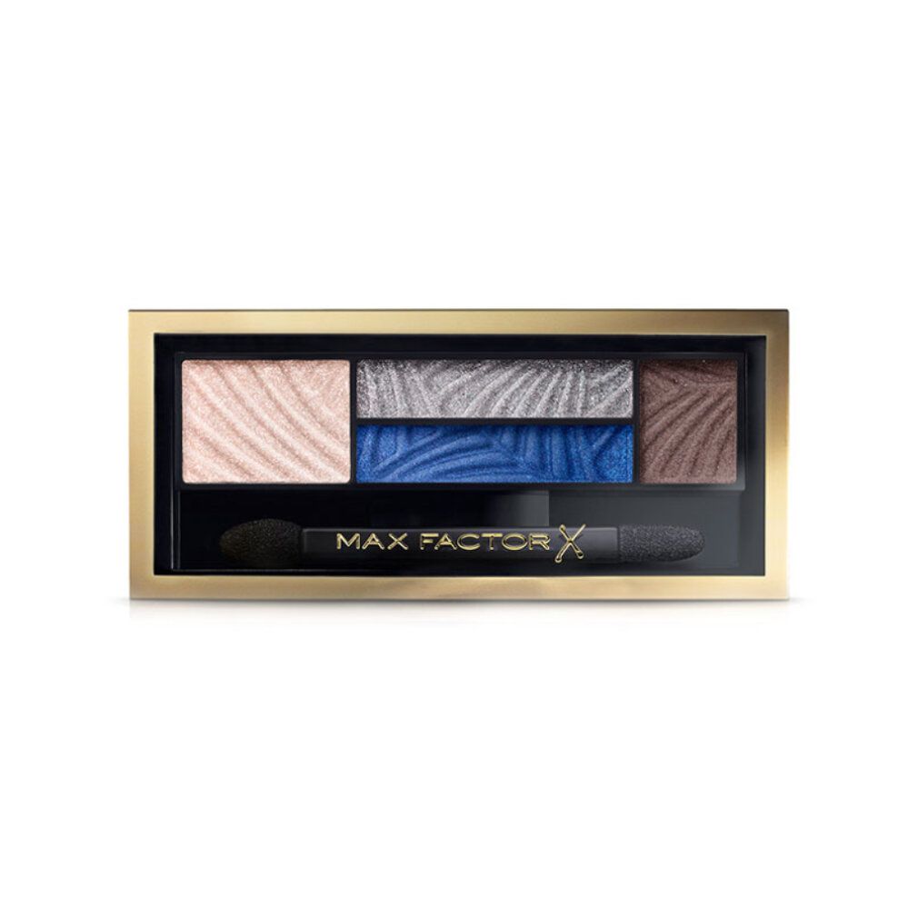 Lidschatten-Palette mit fünf Farben, blau und braun. Goldfarbene Umrandung, schwarzer Applikator. Schriftzug: MAX FACTOR.