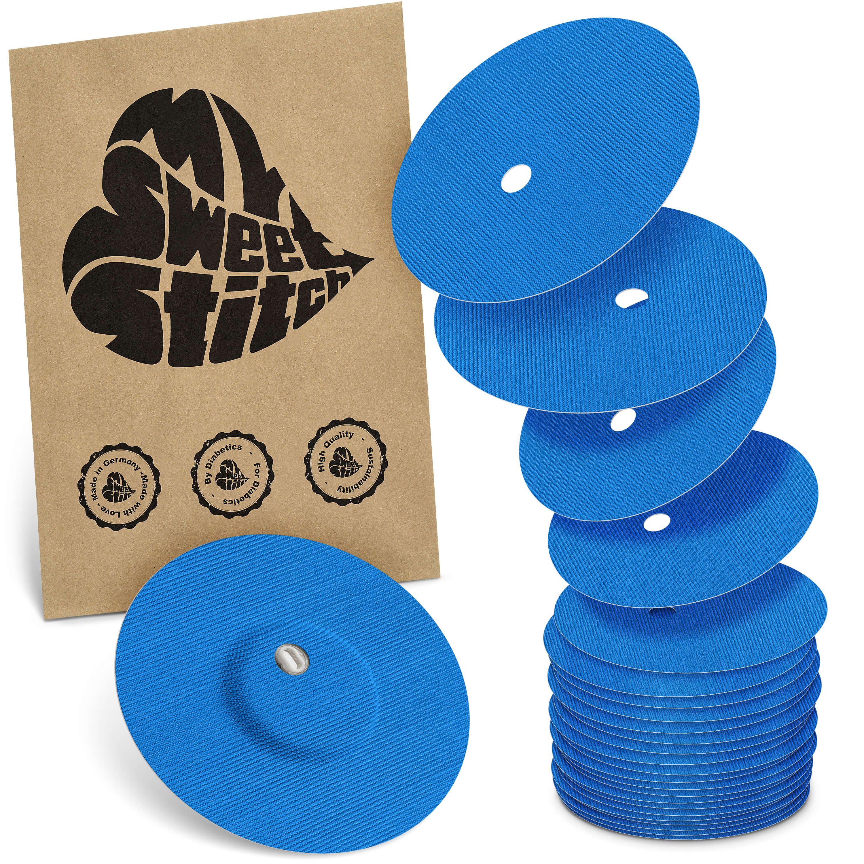 Blaue, runde Pflaster mit Belüftungsloch. Verpackung mit Logo und Qualitätszeichen. Braune Papierverpackung.