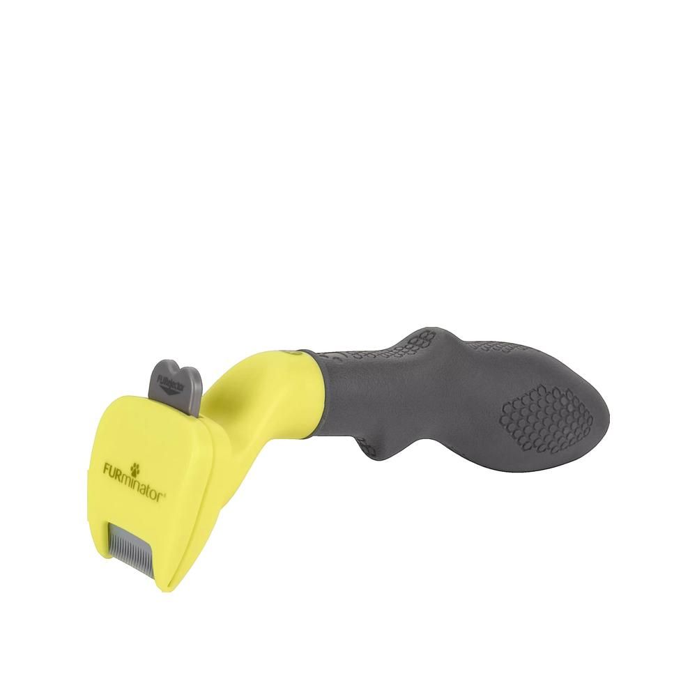 Gelb-graue Fellbürste mit ergonomischem Griff. Der Bürstenkopf hat einen Metallkamm. Das Logo ist sichtbar.