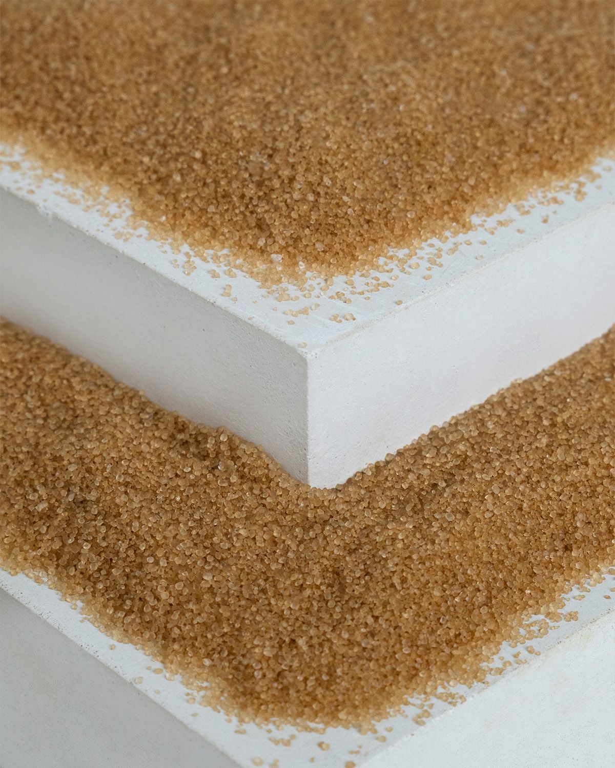 Nahaufnahme von buxtrade Erythritol Bronze, einem feinkörnigen Süßungsmittel.