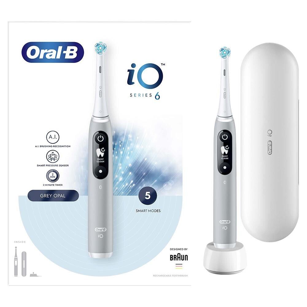 Zwei elektrische Zahnbürsten Oral-B iO Series 6, grau, mit Ladestation und Reiseetui. Verpackung mit Produktinformationen.