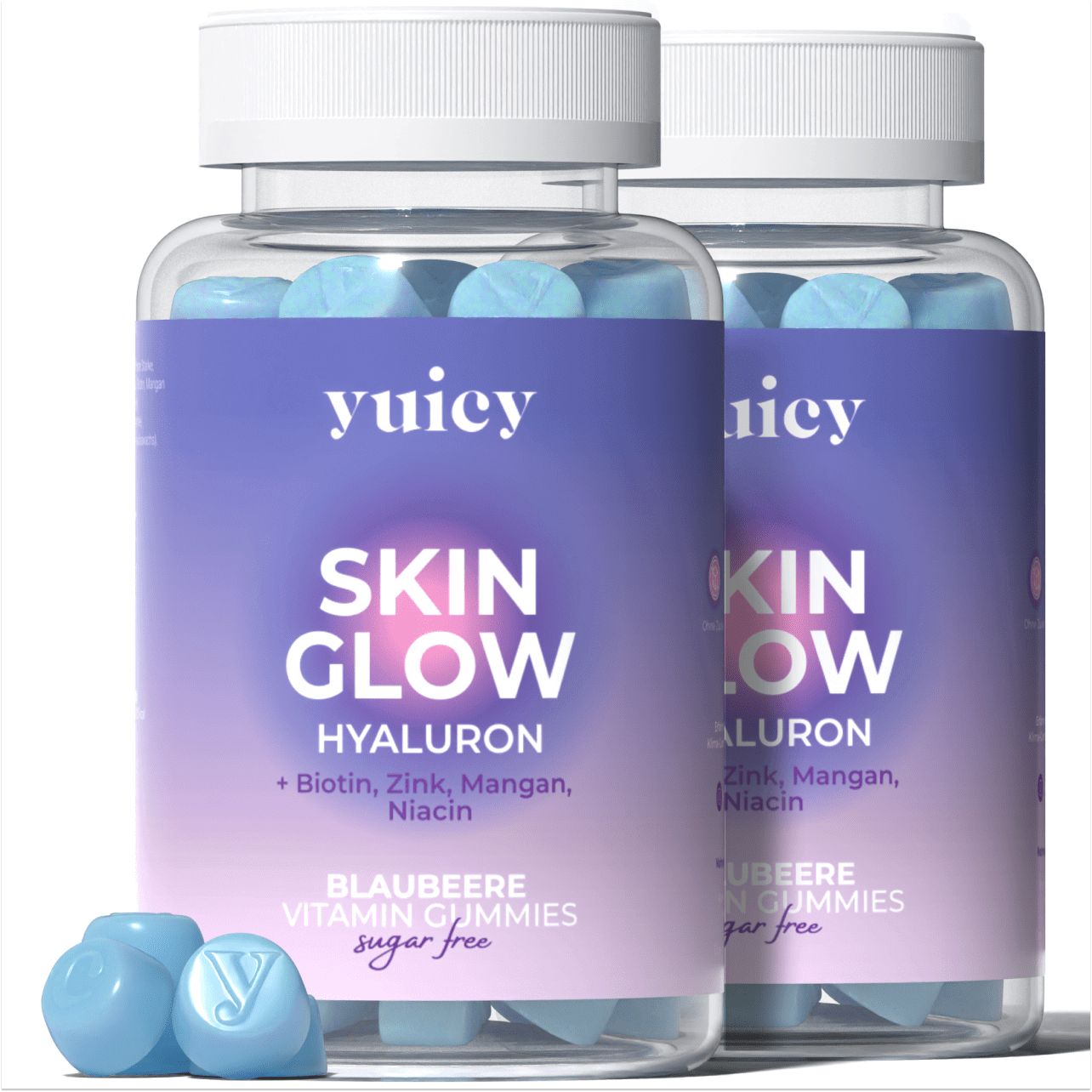 Zwei Flaschen yuicy® Skin Glow Gummies. Blaue, würfelförmige Gummibärchen. Aufschrift: Skin Glow, Hyaluron, Blaubeere, zuckerfrei.