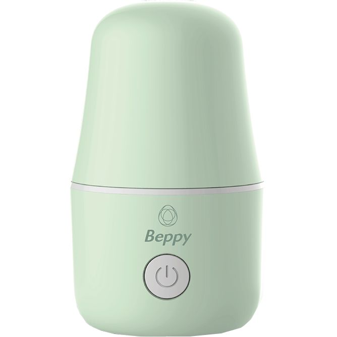 Hellgrüner Dampf-Sterilisator. Auf der Vorderseite steht "Beppy" und ein Ein-/Ausschalter-Symbol. Oben abgerundet, unten breiter.