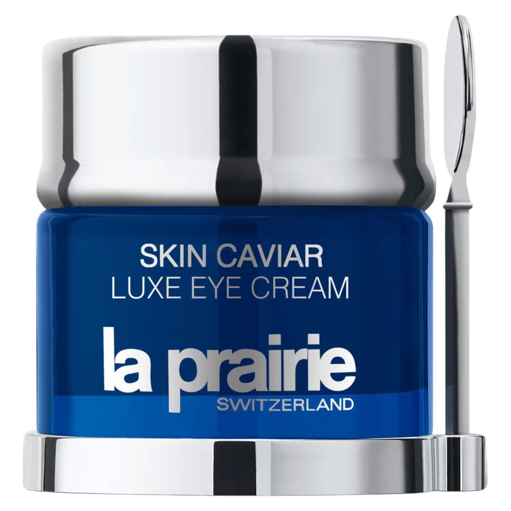 Blaues Glas mit silbernem Deckel und Spatel. Aufschrift: Skin Caviar Luxe Eye Cream, La Prairie, Switzerland.