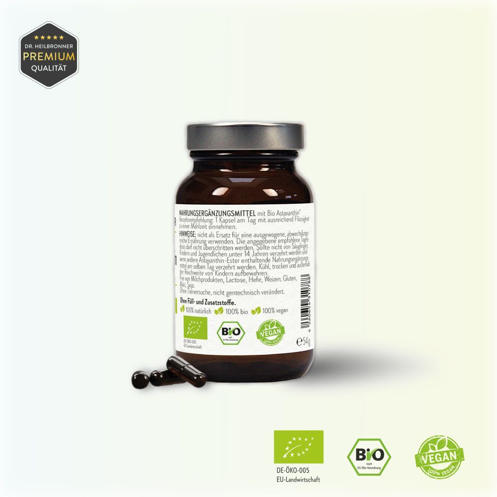 Braune Glasflasche mit Kapseln. Aufschrift: Bio Astaxanthin 8mg, 90 Kapseln. Rückseite mit Informationen. Siegel: Bio, Vegan.