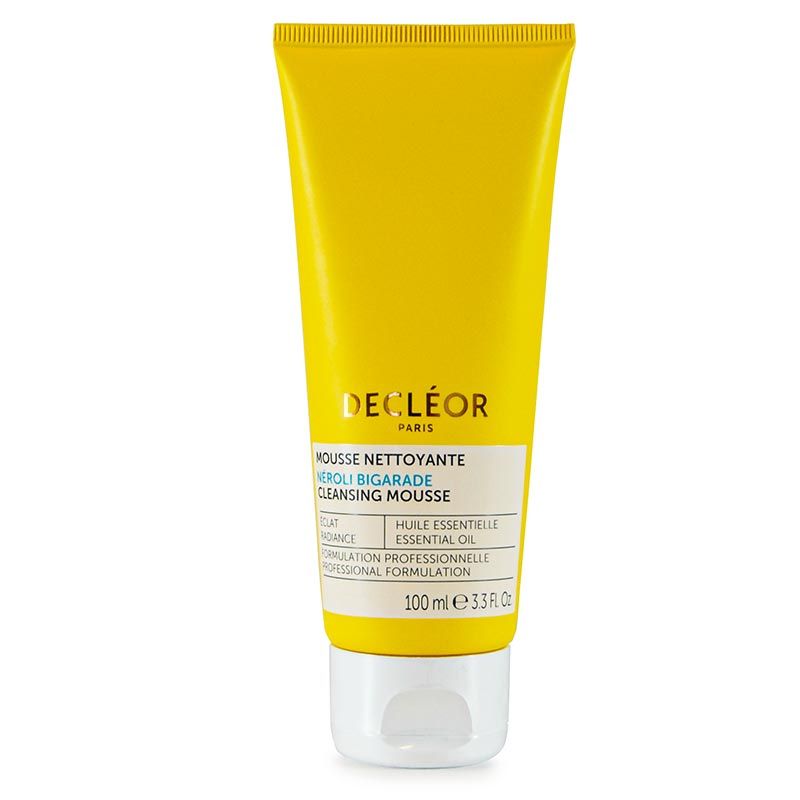 Gelbe Tube mit weißem Verschluss. Aufschrift: DECLEOR PARIS, MOUSSE NETTOYANTE, NEROLI BIGARADE, CLEANSING MOUSSE.