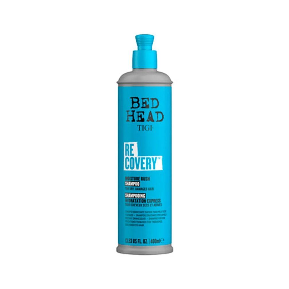Türkis-farbene Shampoo-Flasche mit blauem Pumpkopf. Aufschrift: BED HEAD TIGI RECOVERY MOISTURE RUSH SHAMPOO.