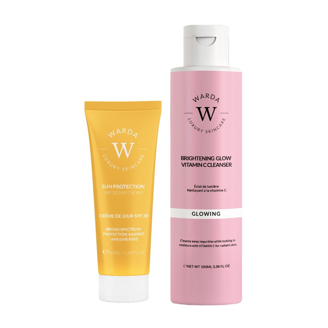 Gelbe Tube und rosa Flasche. Aufschrift: Warda Luxury Skincare, Vitamin C Cleanser, SPF 30 Day Cream. Sonnenschutz.