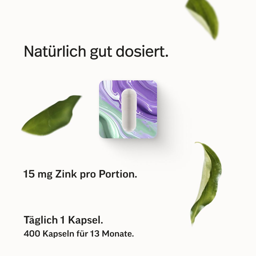 Kapsel auf lila-grünem Hintergrund. Text: Natürlich gut dosiert. 15 mg Zink pro Portion. Täglich 1 Kapsel. 400 Kapseln für 13 Monate.