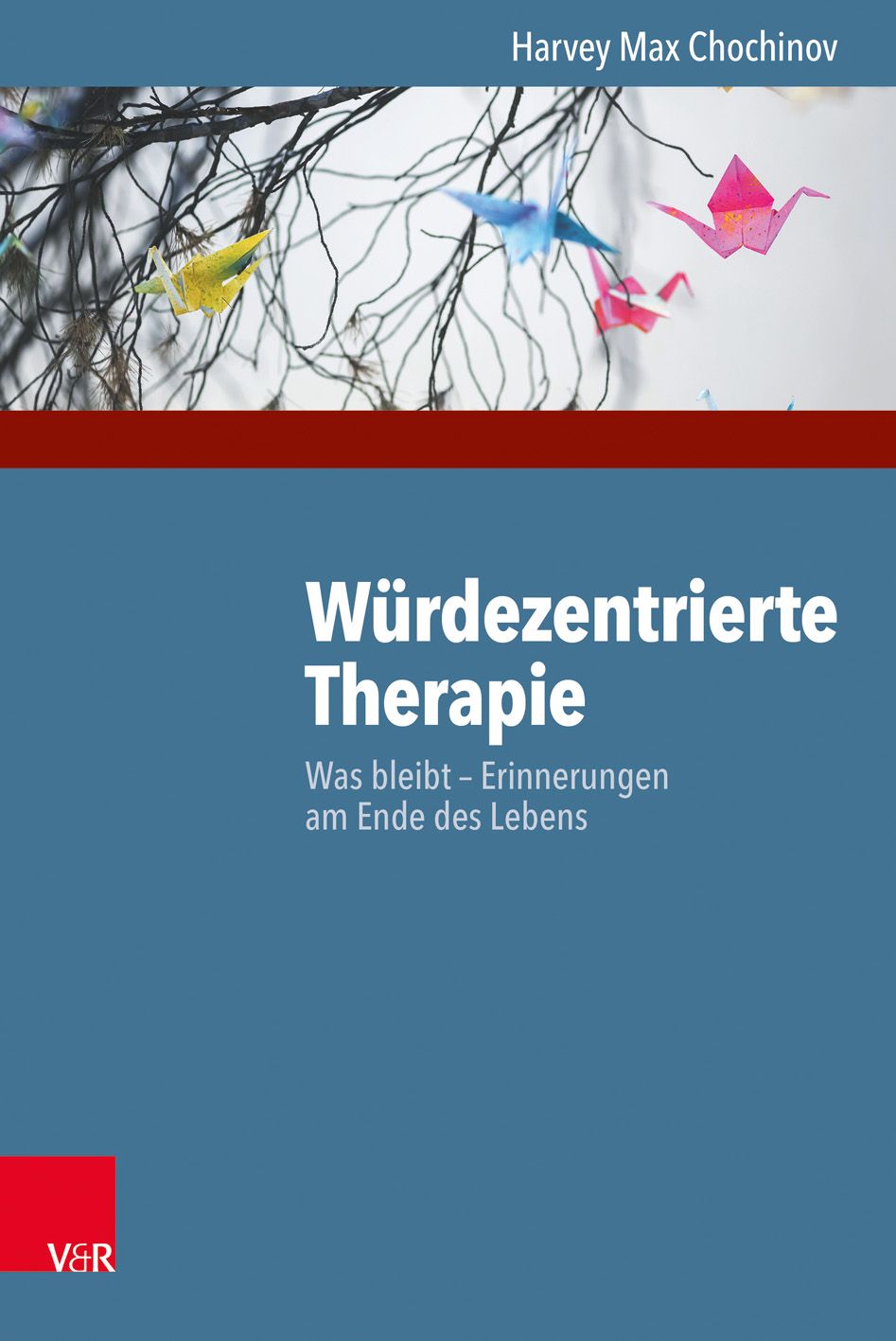 Buchcover mit Titel: Würdezentrierte Therapie. Autor: Harvey Max Chochinov. Origami-Vögel und Zweige im Hintergrund.