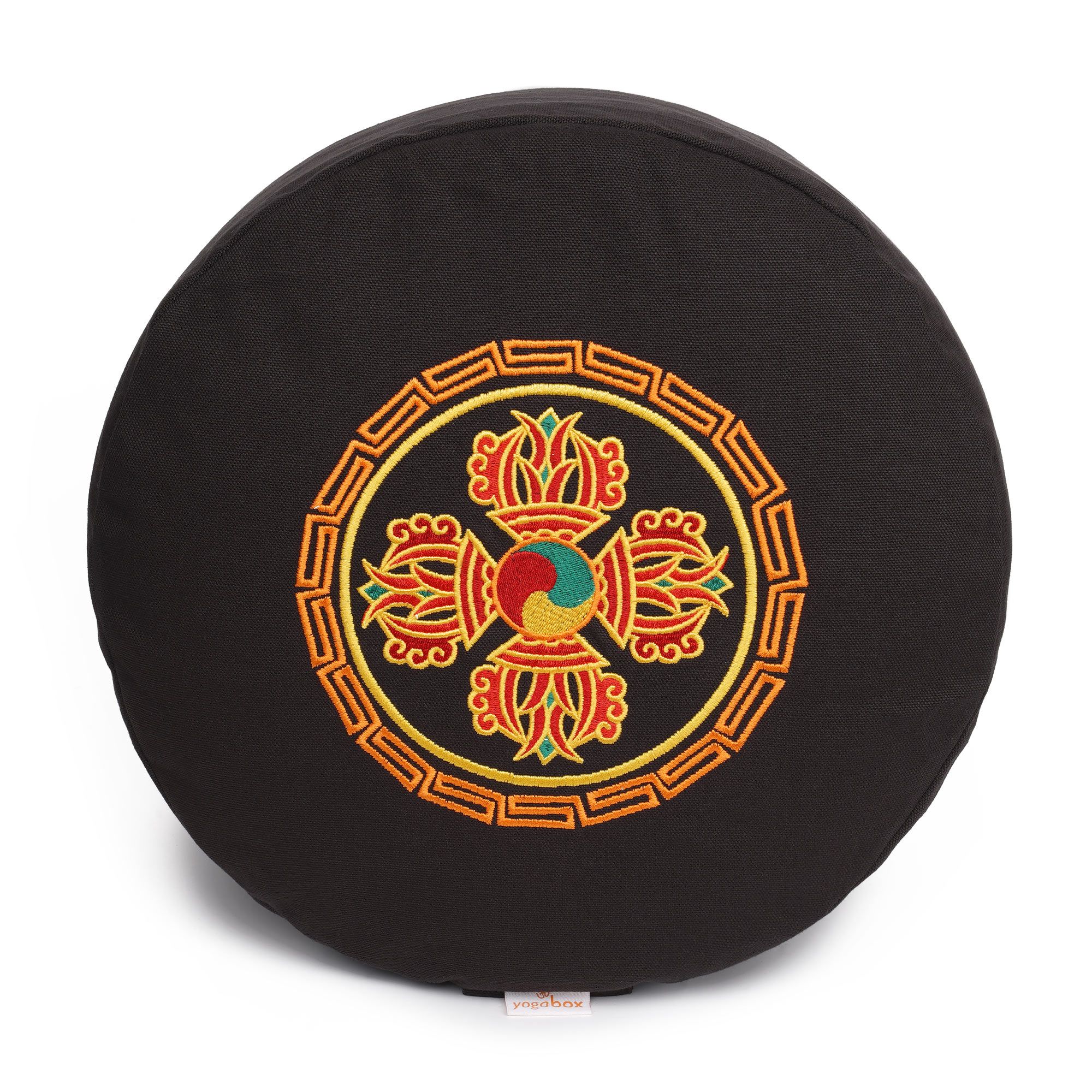 Schwarzes Meditationskissen mit aufgesticktem Glückssitz®-Symbol. Detailansicht des Musters in Gold, Rot und Grün.