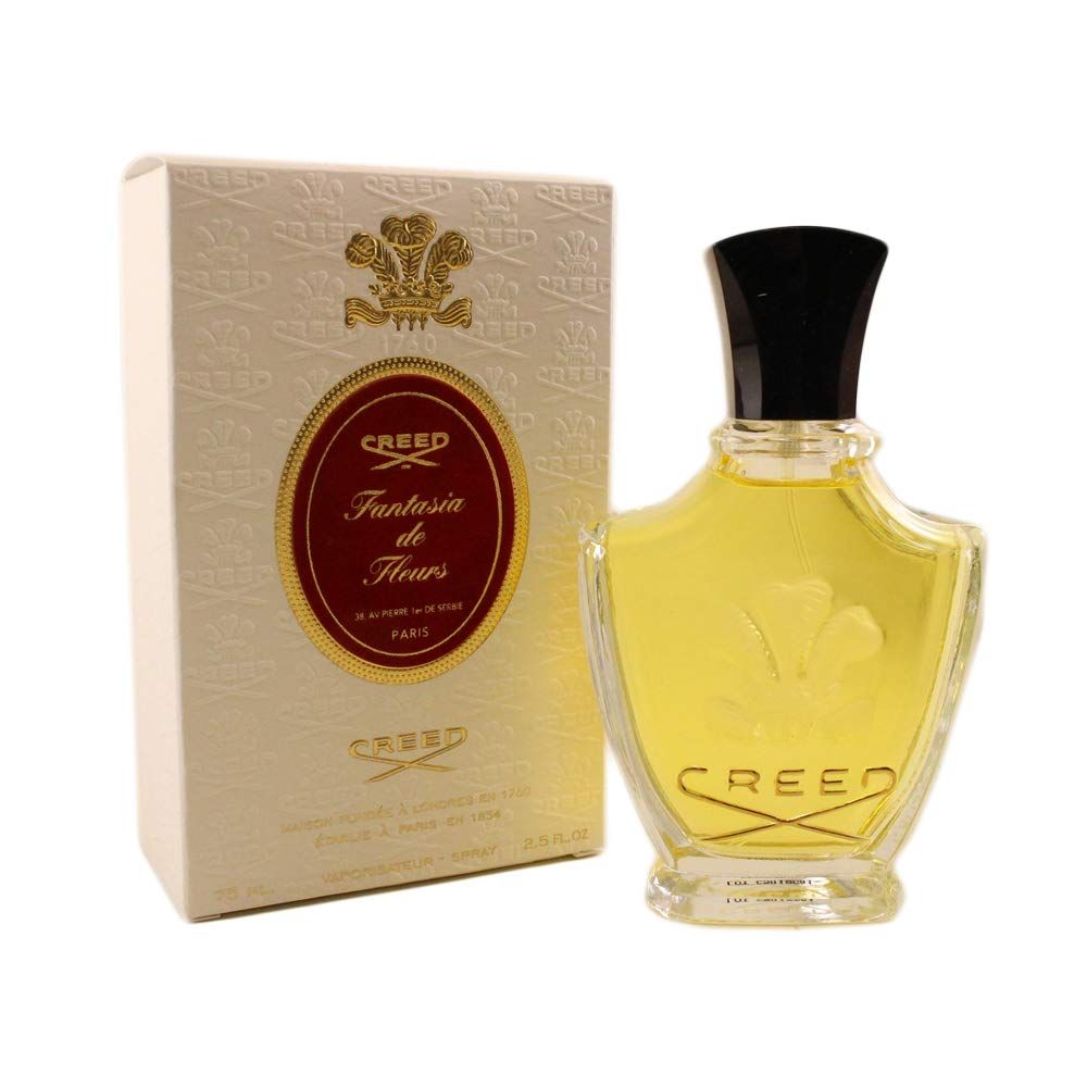 Glasflasche mit schwarzem Verschluss und Schleife, neben grauer Schachtel. Aufschrift "Mr. Burberry".