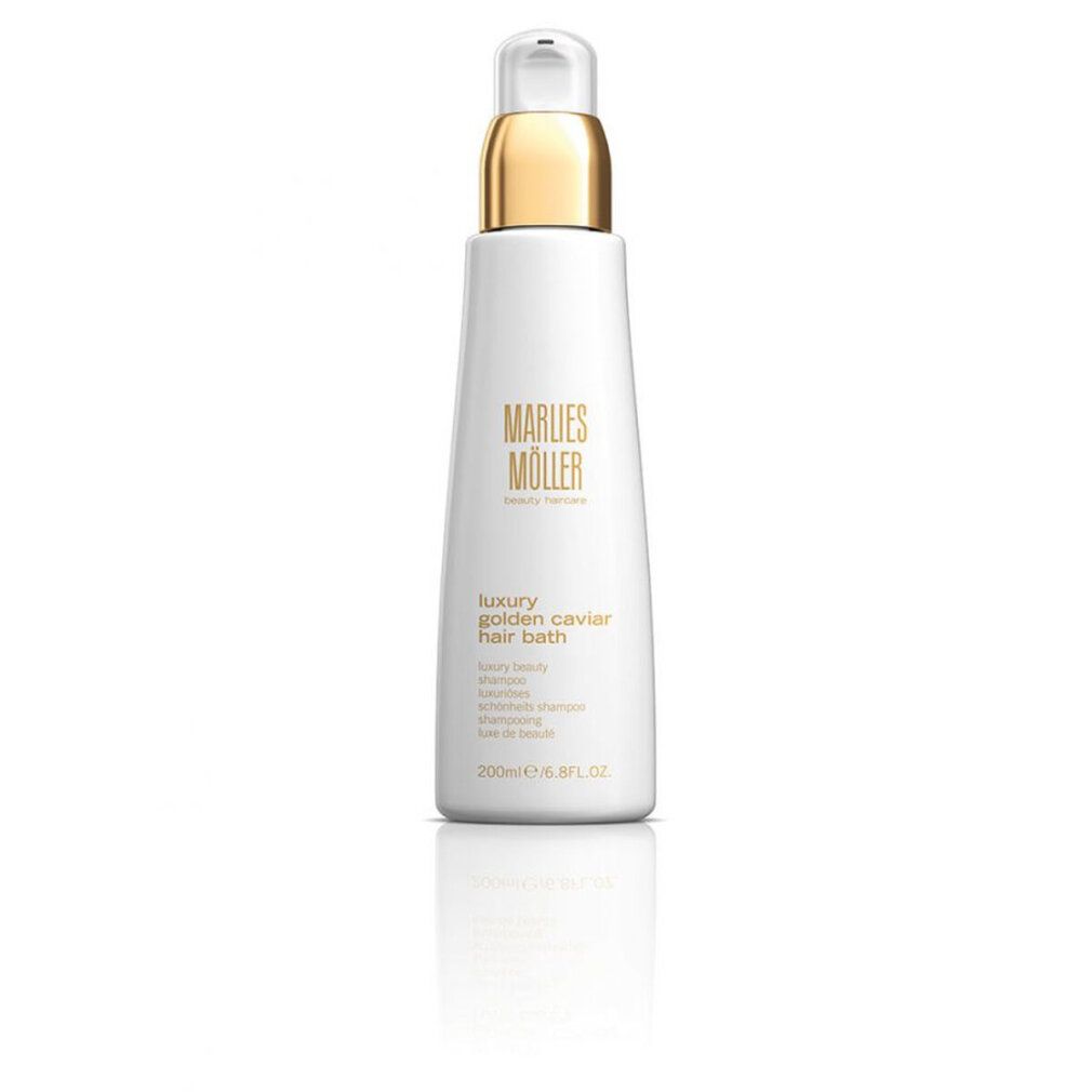 Weiße Flasche mit goldenem Verschluss. Aufschrift: Marlies Möller, Luxury Golden Caviar Hair Bath. 200ml/6.8FL.OZ.