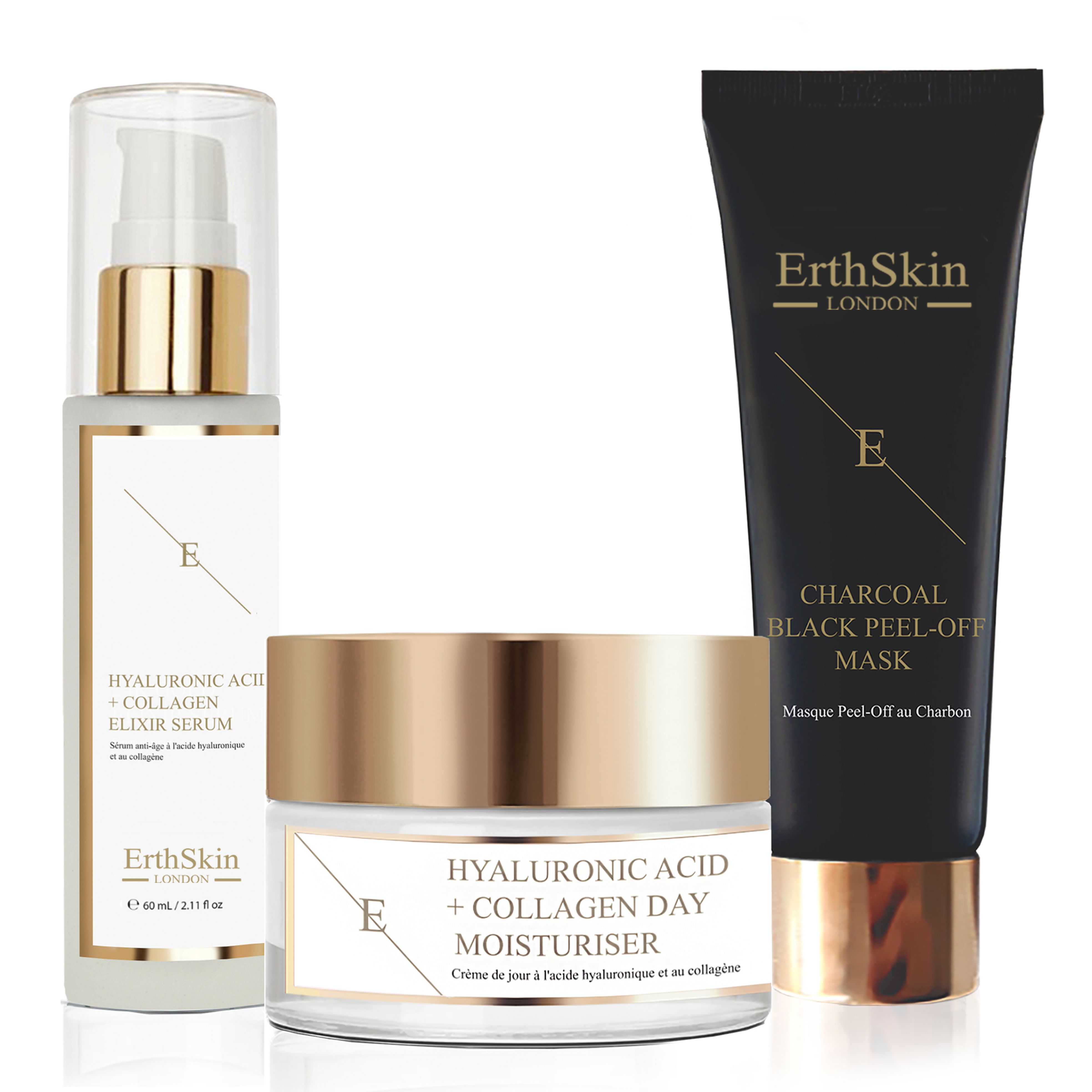 Set aus Serum, Tagescreme und Maske. Produkte mit Goldakzenten und weißem Etikett. Schwarze Maske mit Text.