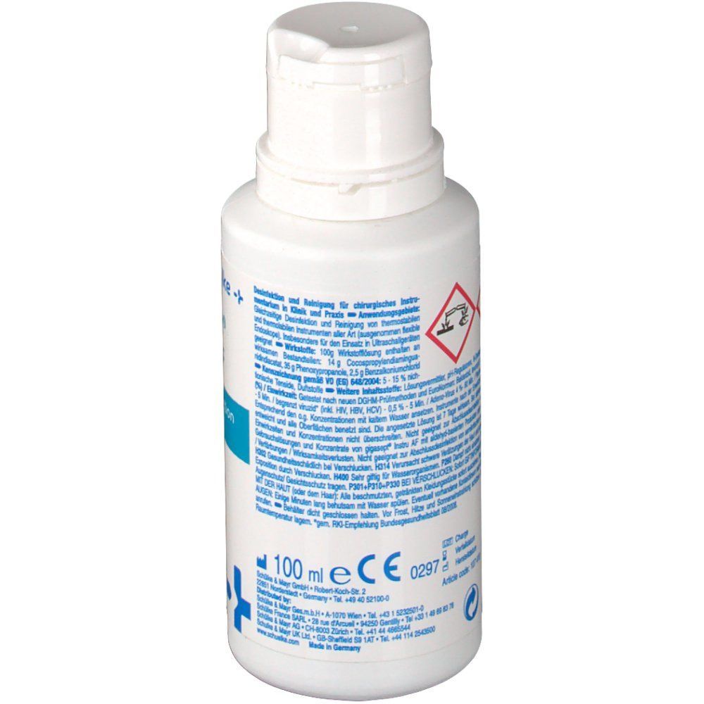 Weiße Flasche, Rückseite mit Text und Symbolen. Beschriftung: 100 ml, CE-Kennzeichnung.