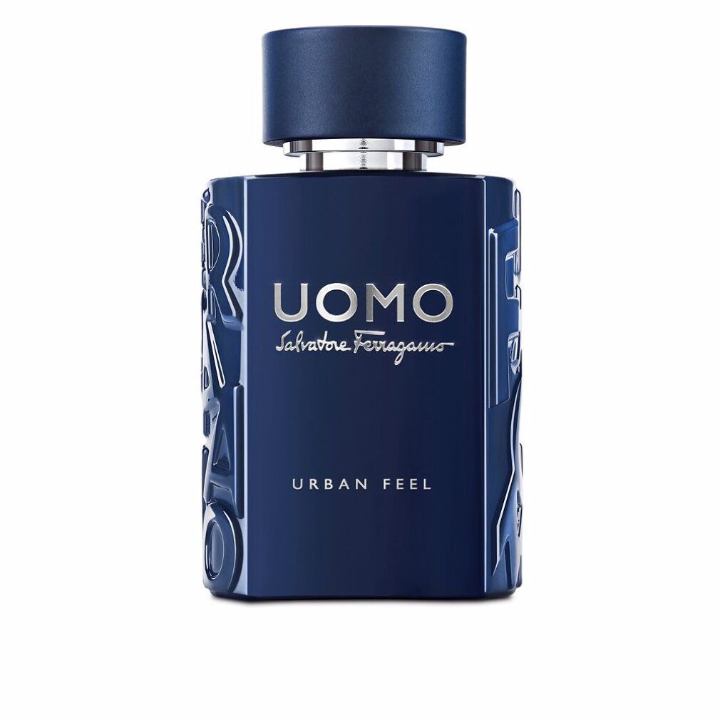 Dunkelblaue Flasche mit silberner Aufschrift: UOMO Salvatore Ferragamo, Urban Feel. Blauer Deckel.