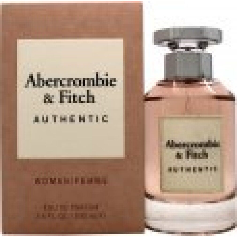 Parfümflasche und Verpackung. Aufschrift "Abercrombie & Fitch AUTHENTIC". Verpackung braun, Flasche rosa.