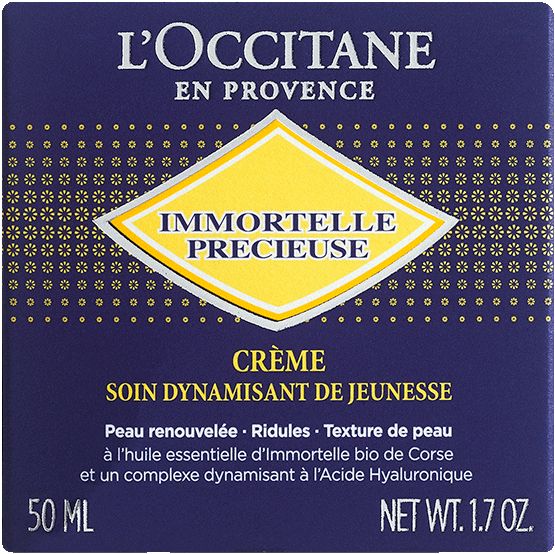 L'Occitane Immortelle Creme Precieuse in blauem Glasbehälter mit silbernem Deckel.