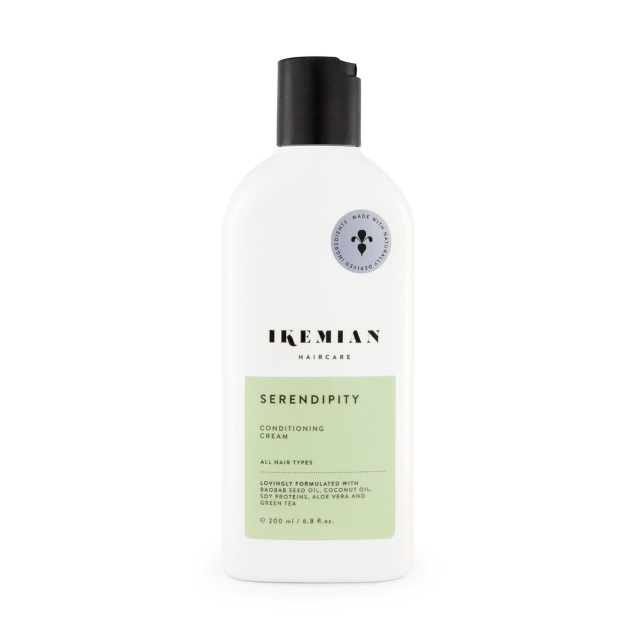 Weiße Flasche mit schwarzem Deckel. Aufschrift: Ikemian, Serendipity Conditioning Cream. Grünes Etikett mit Text. Siegel.