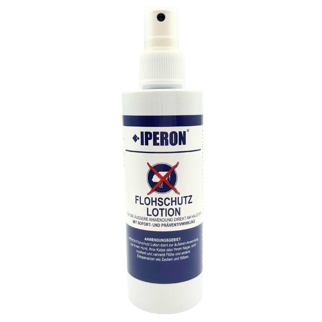 Flasche IPERON® Flohschutz Lotion mit weißem Sprühkopf und blau-weißer Banderole.