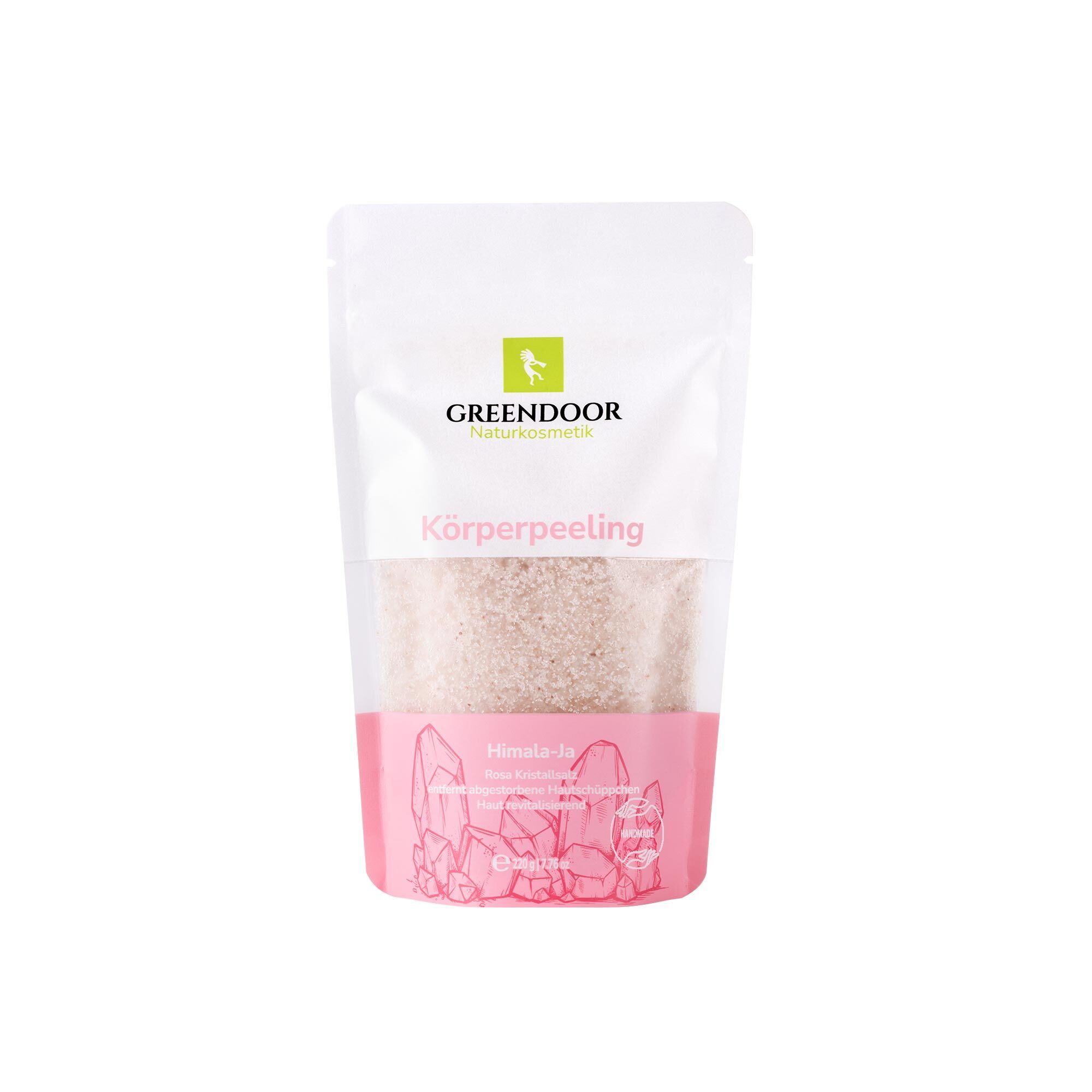 GREENDOOR Körperpeeling in einem weißen Standbeutel mit rosa Kristallen und Schriftzug.