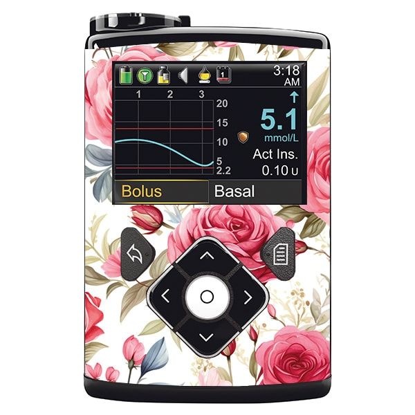 Medizinprodukt mit Rosenmuster. Display mit Messwerten und Bedienelementen. Schwarze Tasten und Displayanzeige.