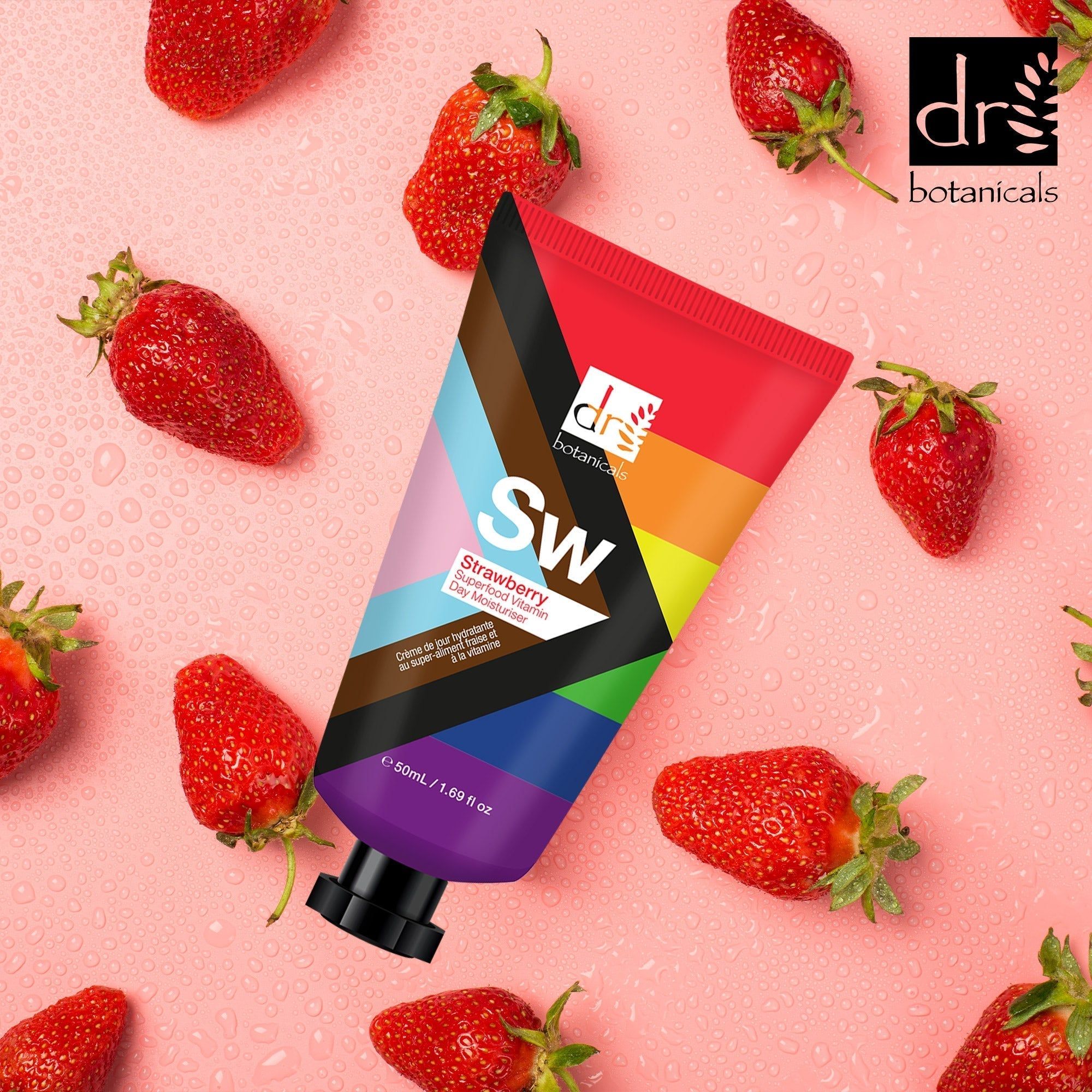 Tube mit farbenfrohem Design, umgeben von Erdbeeren. Aufschrift: Dr Botanicals, Sw, Strawberry Day Moisturiser.