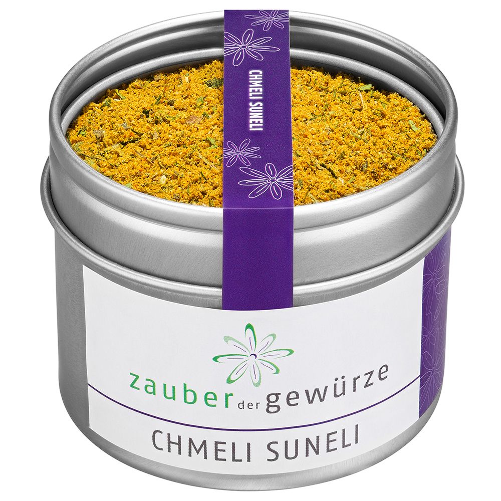 Runde Dose mit Gewürzmischung. Aufkleber mit Produktname und Logo. Lila Band mit Schriftzug. Deckel geöffnet.