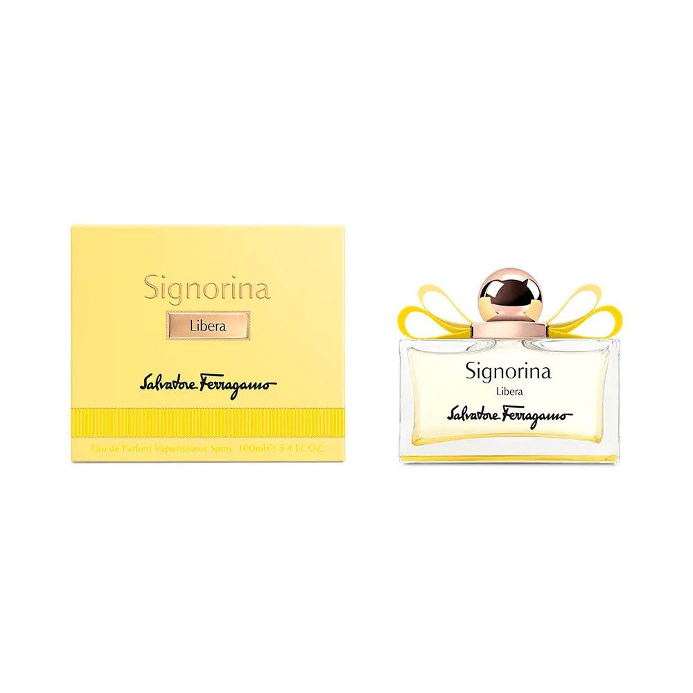 Salvatore Ferragamo Signorina Libera Eau de Parfum Flakon und Verpackung. Gelbe Box mit Schriftzug, klarer Glasflakon mit goldenem Verschluss und gelber Schleife.