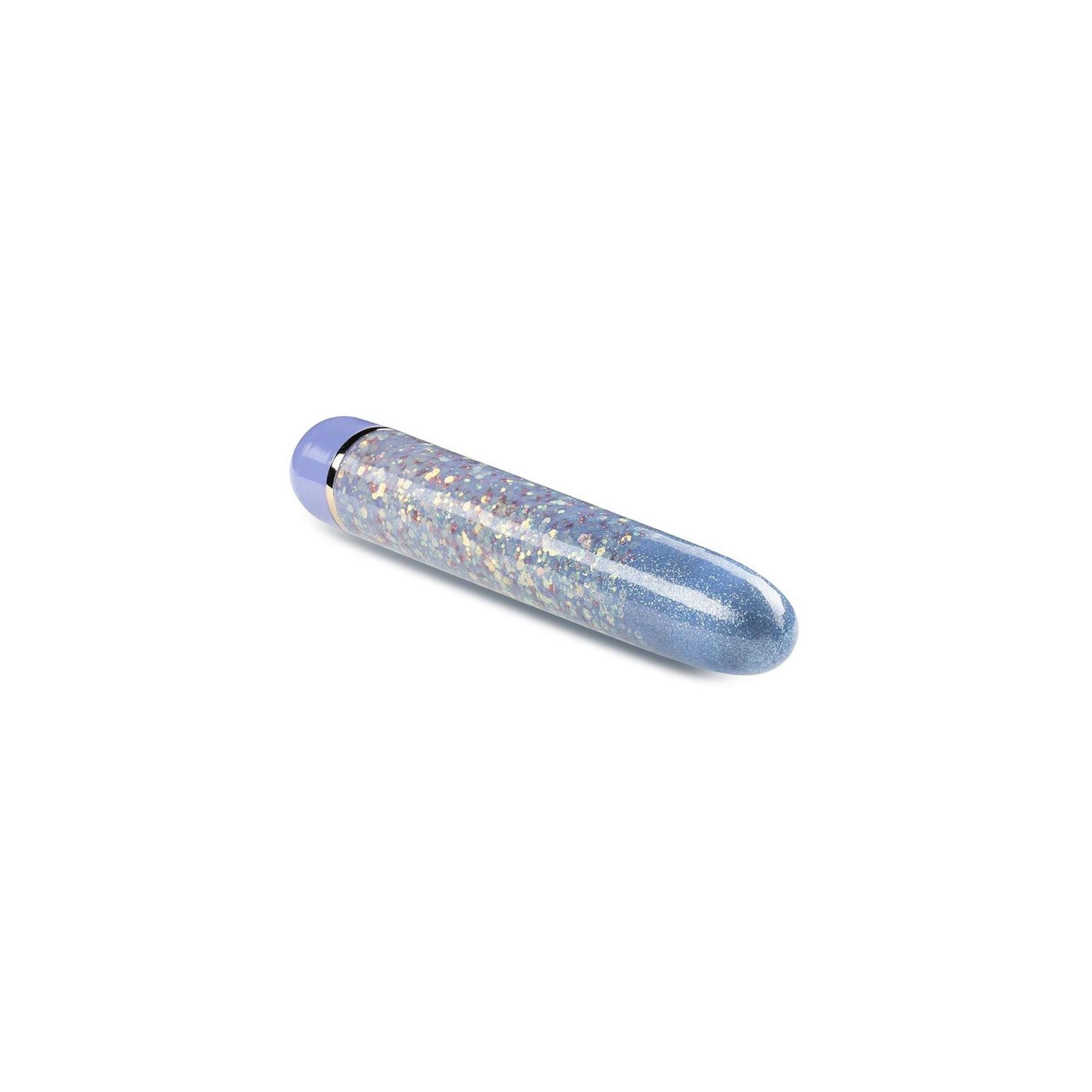 Zylindrisches Wellness-Produkt in Blau und Glitzer. Mit abgerundeten Enden. Auf weißem Hintergrund.
